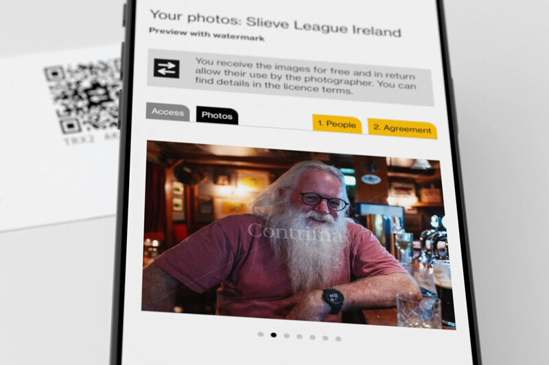 Mobile phone showing a gallery and a portrait